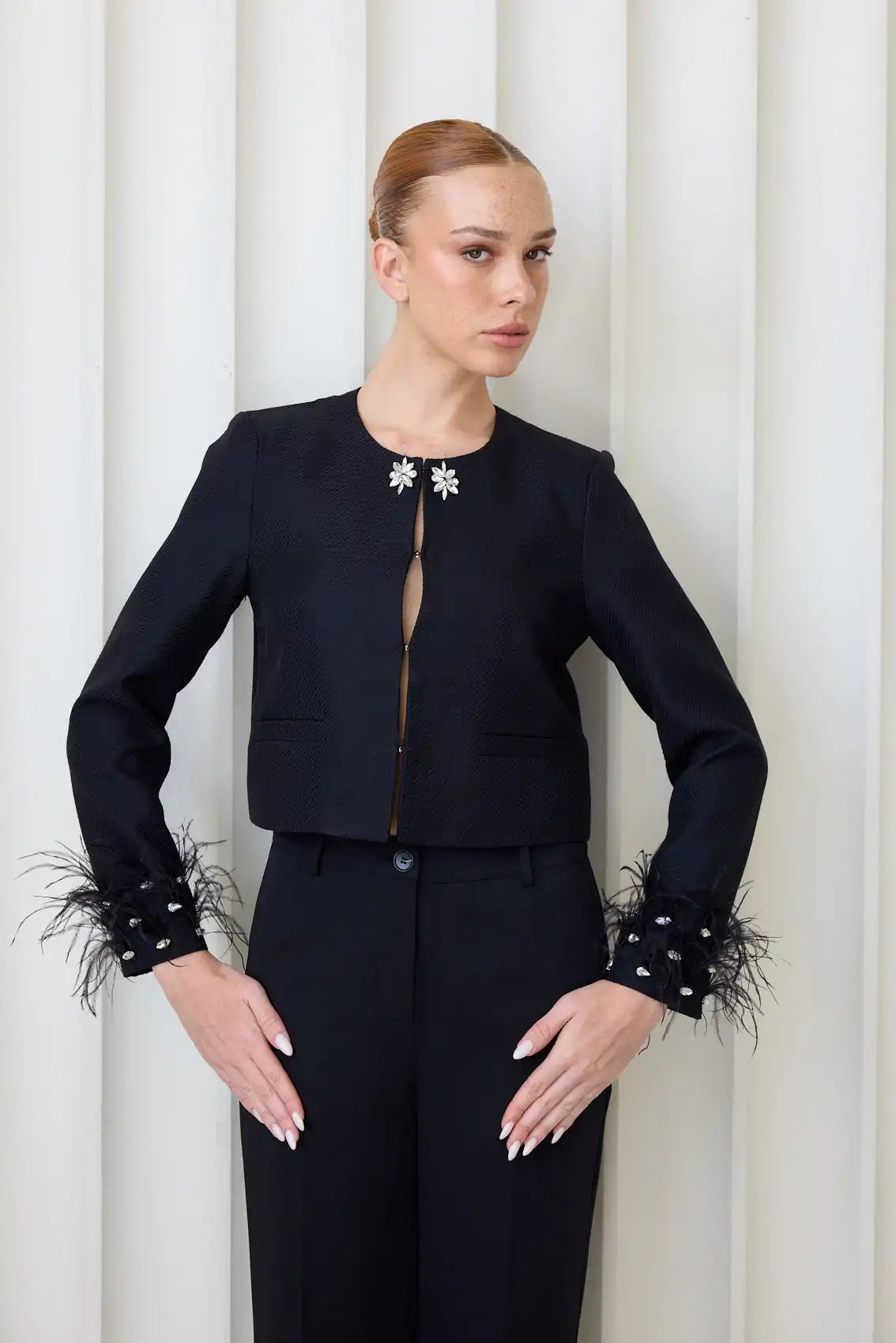 ז'קט טוויד שרוולי נוצות